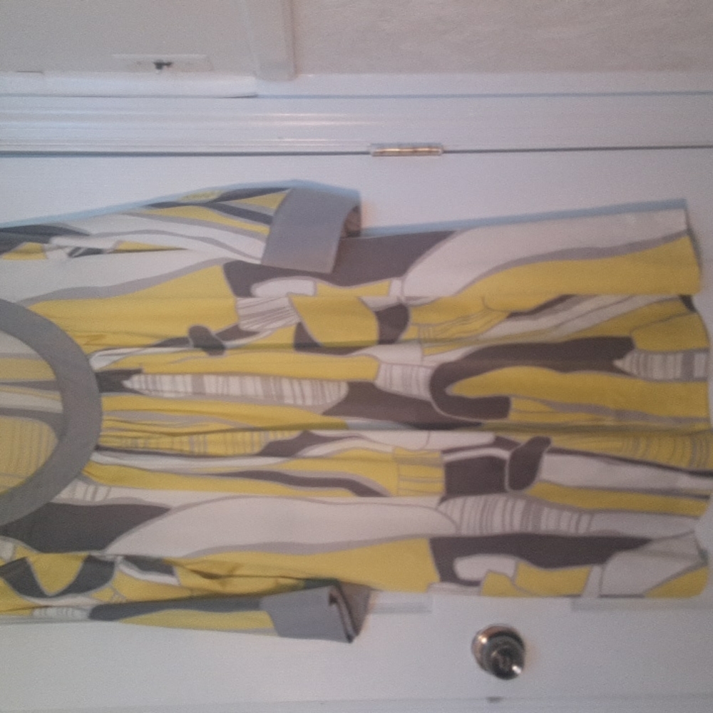 A knee length soft fabric Margaret dress.  Colors of grey, yellow, white size 12